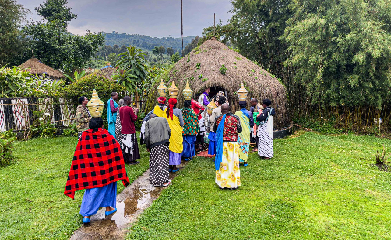 Men and Women demonstrating the Rwandan culture at Gorilla guardian village known as the Ibyiwacu culture