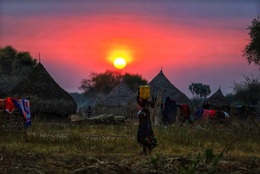 a sunset in the Mundari cattle camp