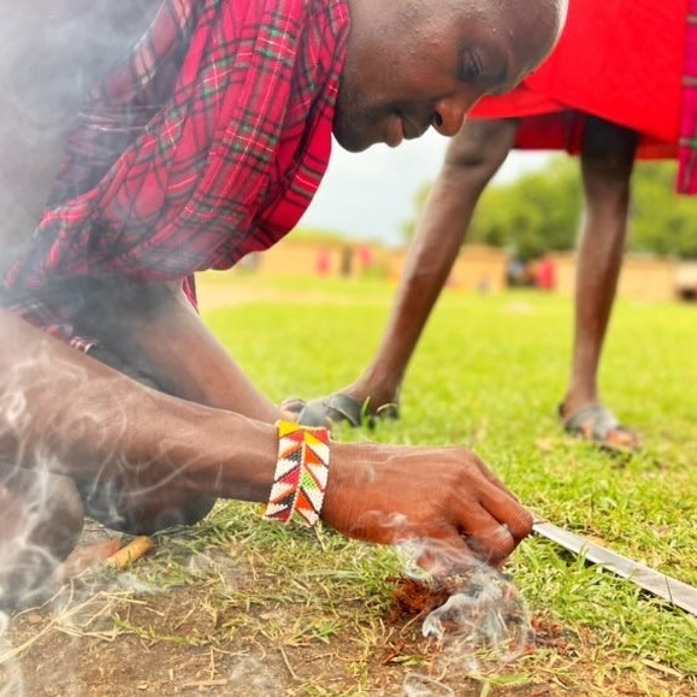 Masai making fire